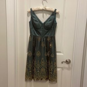 Adrianna Papell Boutique green overlay beaded cocktail dress.